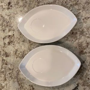 2 white serving platers